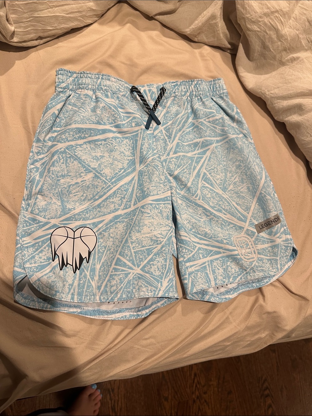 Overtime Light Blue Basketball Shorts with White Graphic